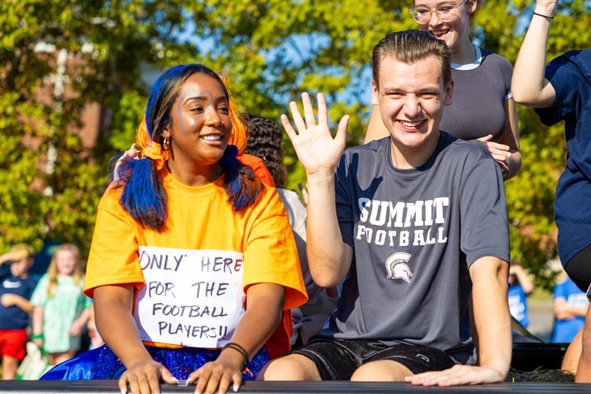 Students at the Summit High homecoming parade